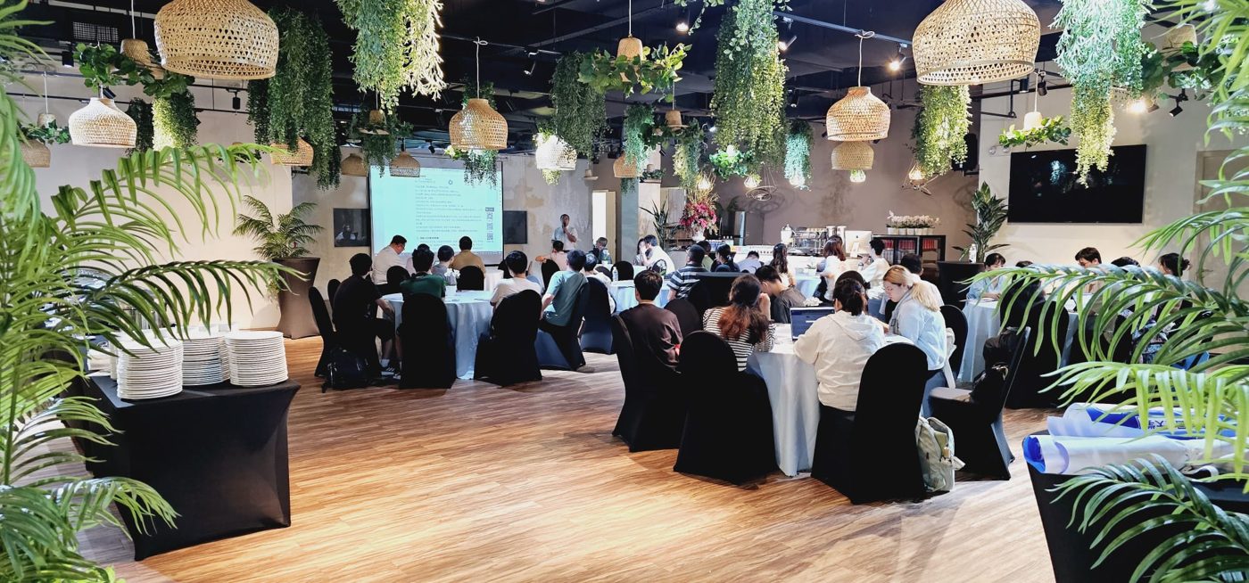 Reception area with hanging greenery at the SMU Alumni Event